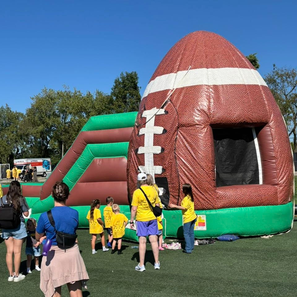 Football bounce house with slide combo rental in Columbus, Ohio – exciting sports-themed inflatable perfect for school field days, backyard parties, and football events in Dayton, Dublin, Lancaster, Delaware, Newark, Hilliard, Grove City, Reynoldsburg, Cincinnati, and Springfield. Where to rent a bone house in Franklin, Ohio?