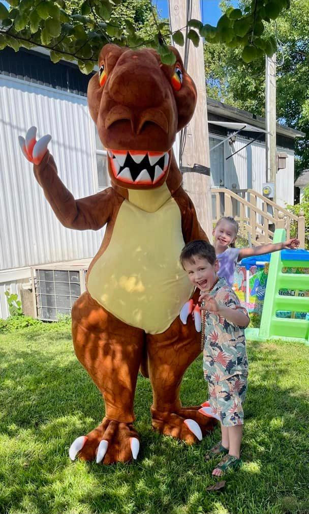 Thumbnail: A special appearance by a Dinosaur - costumes for parties Columbus Ohio Dinosaur for hire Ohio