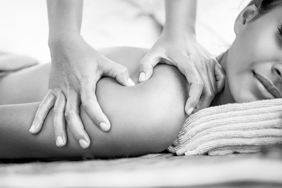 Woman having a shoulder massage