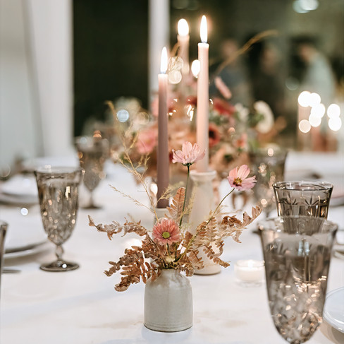 Thanksgiving table with glassware and candlelight from Hensley rentals