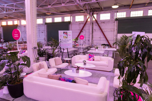 Lounge seating with plants at corporate conference event