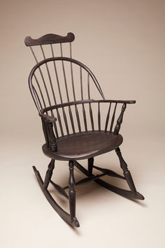 Nine Spindle Sackback Rocking Chair
