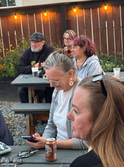 Group of people at an outdoor evening gathering