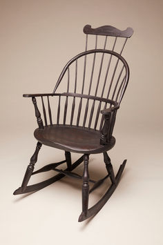 Nine Spindle Sackback Rocking Chair