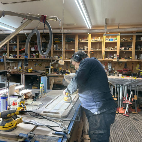 He is sanding glue off (ready for over night in oil).jpg