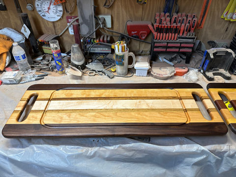 He waxes the board.jpg