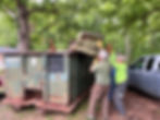 Heave! Ho!! They got it all in! We lined the tires up outside of the dumpster for proper disposal! L-R: Kevin Hunt, Mike Pierce, and Mike Block. Photos by Beth Stenstrom.