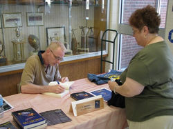Tom Kubicek Signing a Book