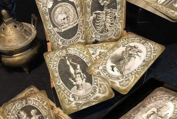 Multiple cards arranged on a table from the Deck of the Dead.