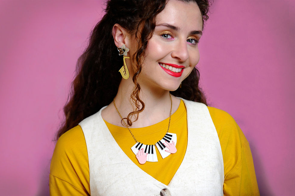 Thumbnail: Piano Player Necklace
