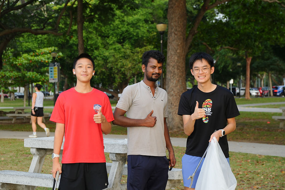 Three men plogging, holding thumbs up with a trash bag