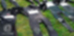 neoprene wetsuits laid on grass