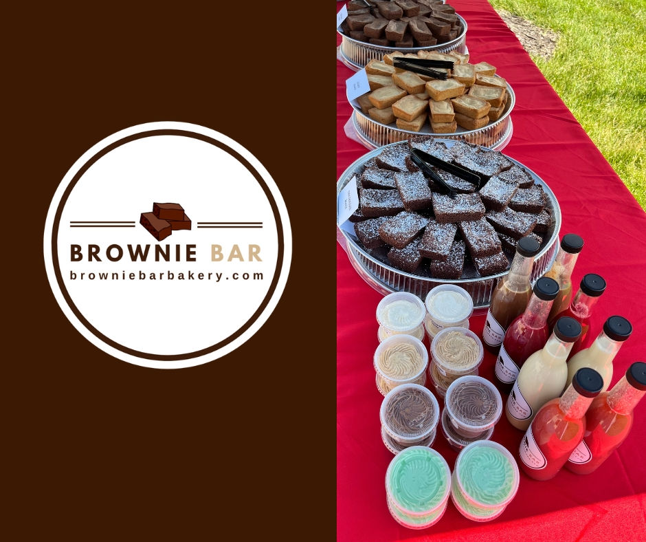 Close-up view of a brownie bar setup with assorted toppings in colorful bowls
