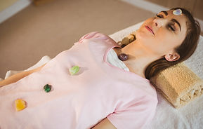 Young woman at crystal healing session i