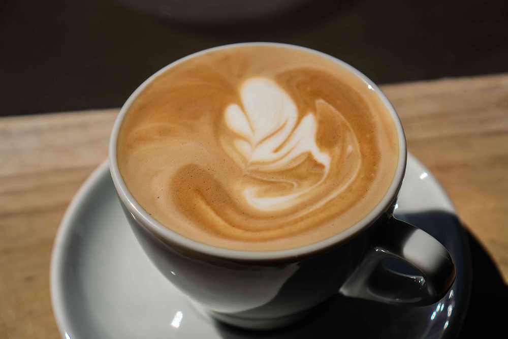 Small flat white coffee