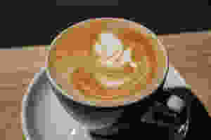 Small flat white coffee