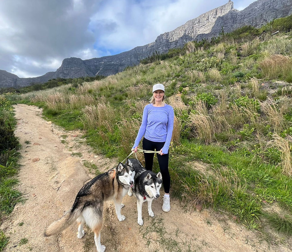 Back on her feet and back on the mountain! After undergoing a groundbreaking advanced endoscopic spinal procedure at Netcare Christiaan Barnard Memorial Hospital, where German and South African neurosurgeons collaborated to repair a cerebrospinal fluid leak caused by an extremely rare condition, Carmen Dippenaar cherishes every step here while walking Maddie and Noah on Table Mountain.