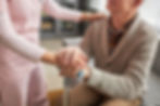 Caregiver caring for elderly man