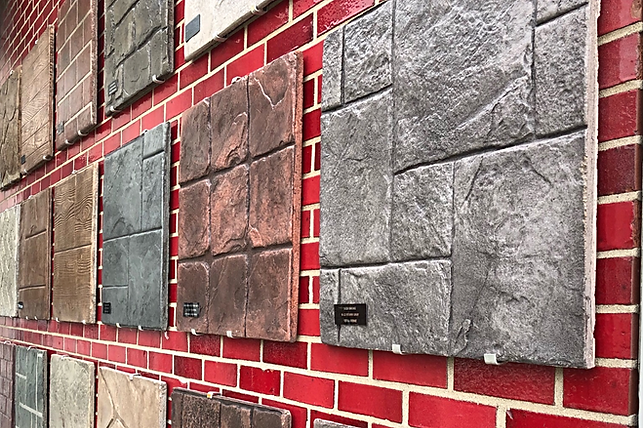 Samples of our decorative stamps hung up on a wall.