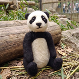 Felted Panda bear approx 25 cm. Movable limbs.