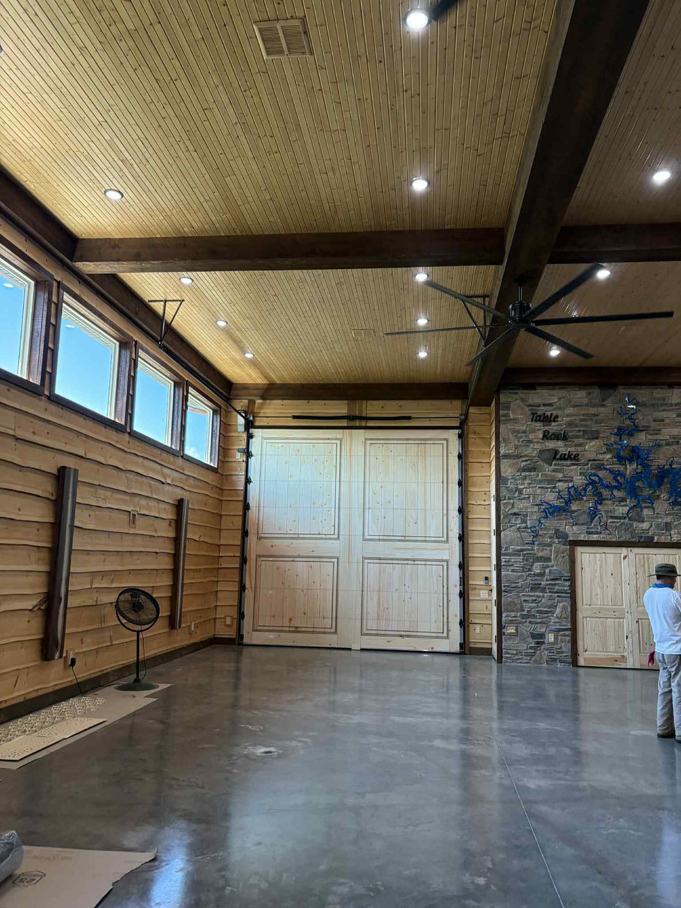 Large garage door wrapped to look like wood