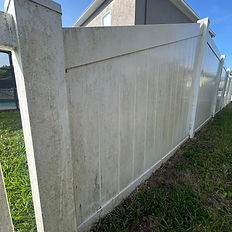 Vinyl fence restoration removing dirt and algae, before and after Glow Power Wash