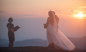 Couple exchanging vows on Adirondack mountaintop