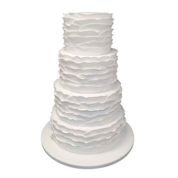 Four-tier white wedding cake with delicate sugar paste ruffles.