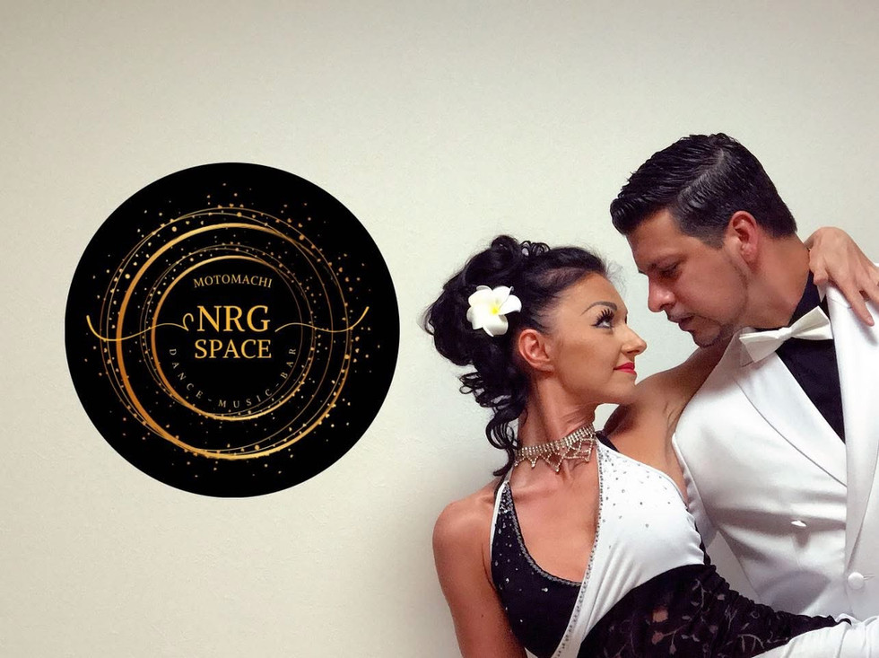 Argentine Tango dancers and teachers Maryna Amauri and Cesar Canisales posing together inside their tango studio NRG SPACE Motomachi in Yokohama, welcoming students from all levels and countries.