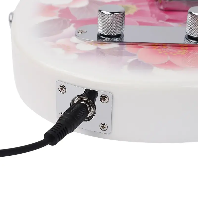 Thumbnail: `Close-up of a cable plugged into the input jack of a Bullfighter electric guitar with chrome control knobs.`