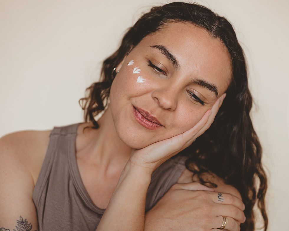 Woman with face cream by clc studio
