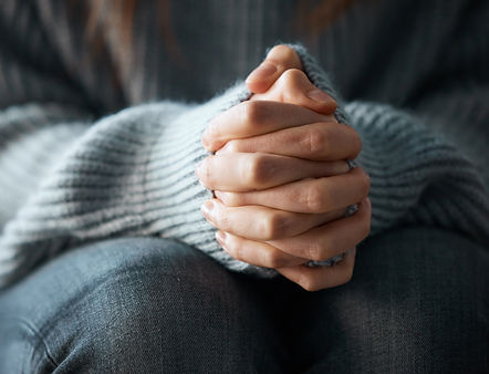 Putting in the hard work. Shot of a woman nervously clasping her hands together..jpg