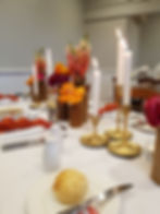 Eathware Vases with Florals and Gold Candle Sticks