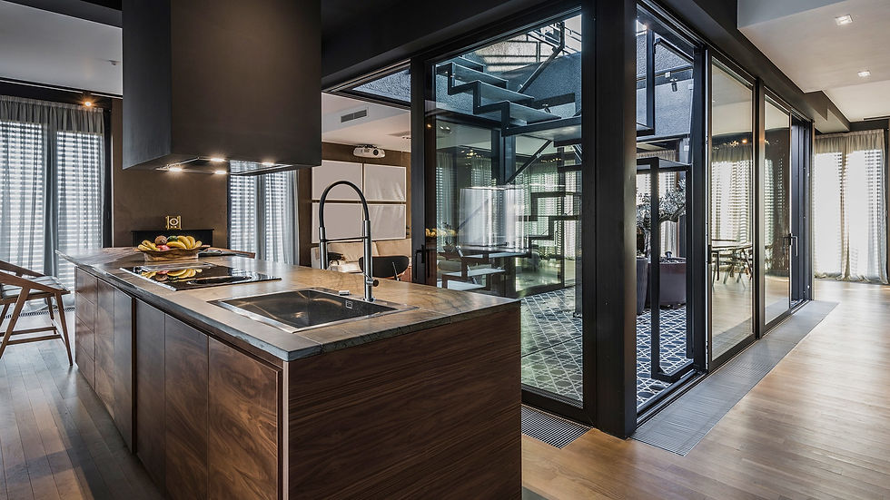 A stylish modern kitchen design, featuring clean lines, minimalist aesthetics, a blend of natural materials for countertops, and state-of-the-art appliances, exuding a warm, inviting atmosphere