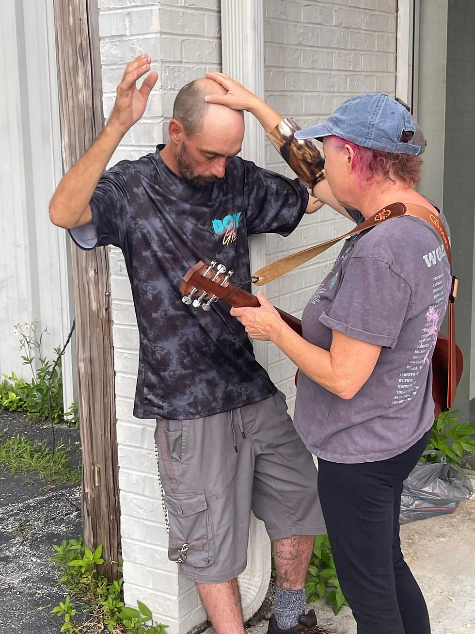 praying homeless.jpg