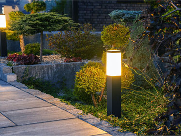 A view of permanent lighting fixtures from Light Source, elevating the outdoor lighting.