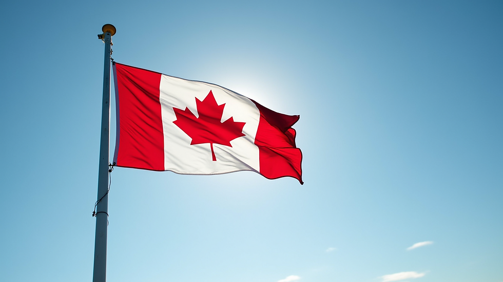 Wide angle view of a Canadian flag waving against a backdrop of a clear blue sky