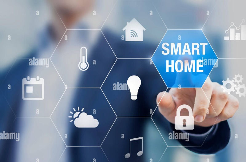 Smart LED bulb being controlled through a smartphone app in a modern living room