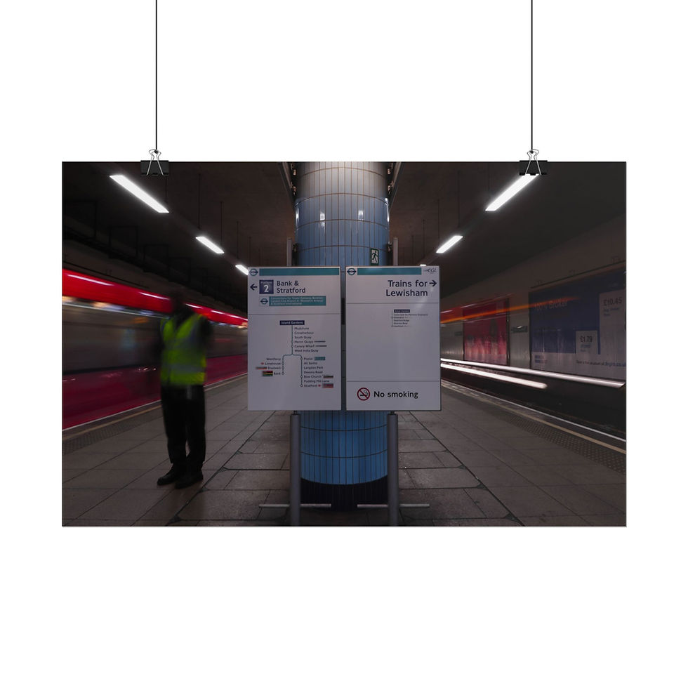 Thumbnail: Worker in high-vis vest on subway platform with info signs, blurred train.
