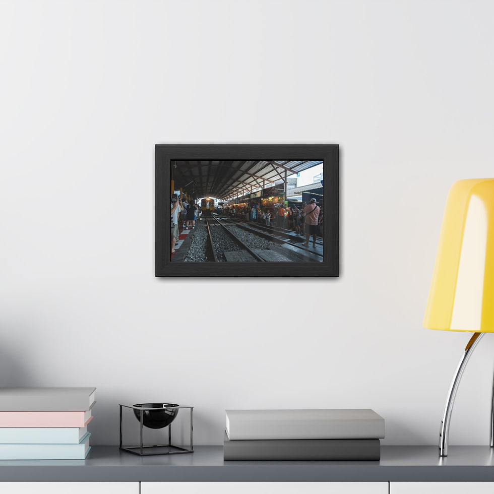 Thumbnail: Framed art displaying a train station, mounted above a modern console table.