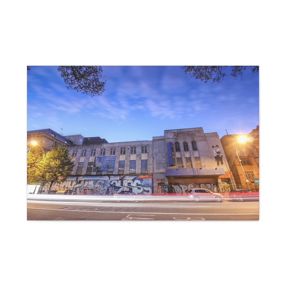 Thumbnail: City building at dusk, vehicle light trails, vibrant blue sky.