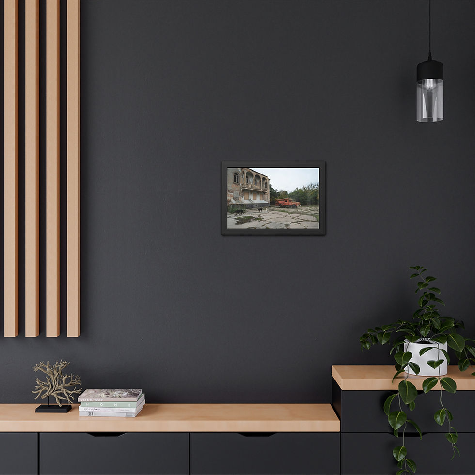 Thumbnail: Framed print of a ruined building and abandoned red vehicle.