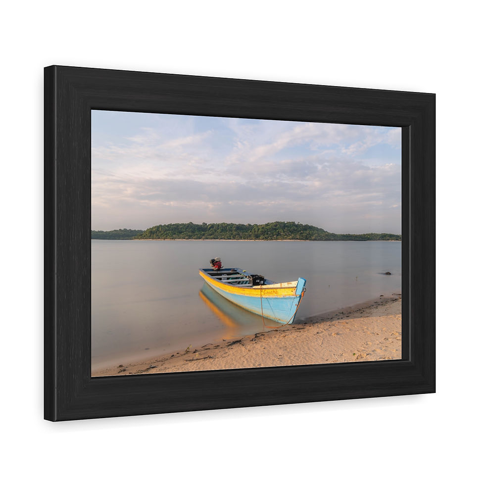 Thumbnail: Colorful blue-yellow boat on sandy beach by calm river, framed art.