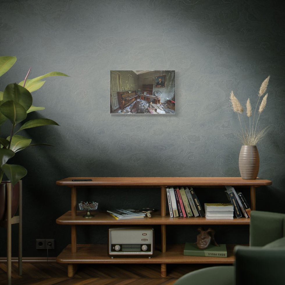 Thumbnail: Framed artwork on dark wall above wooden console in modern room.
