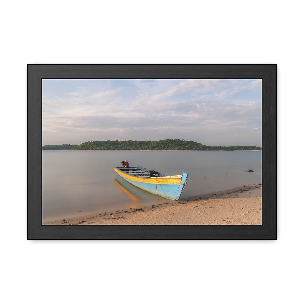 Thumbnail: Colorful wooden boat on sandy beach by calm water and distant land.
