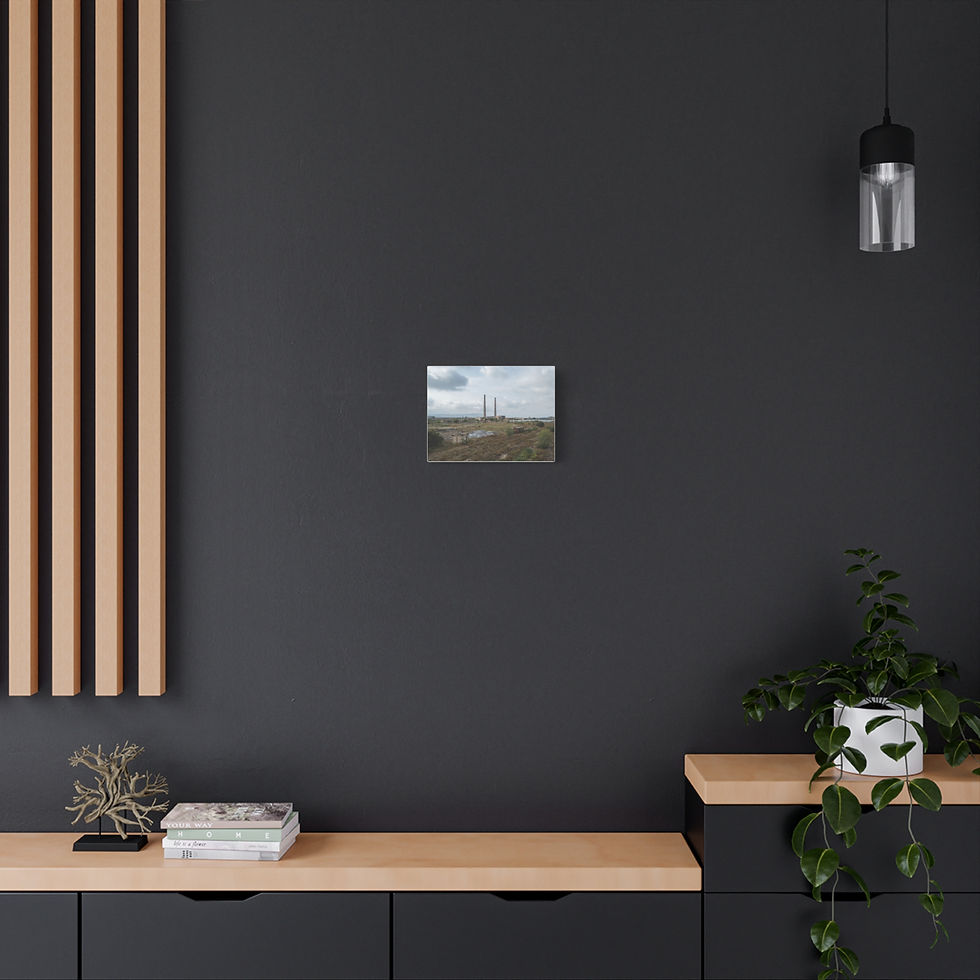 Thumbnail: Small industrial landscape picture on dark gray wall above modern desk.