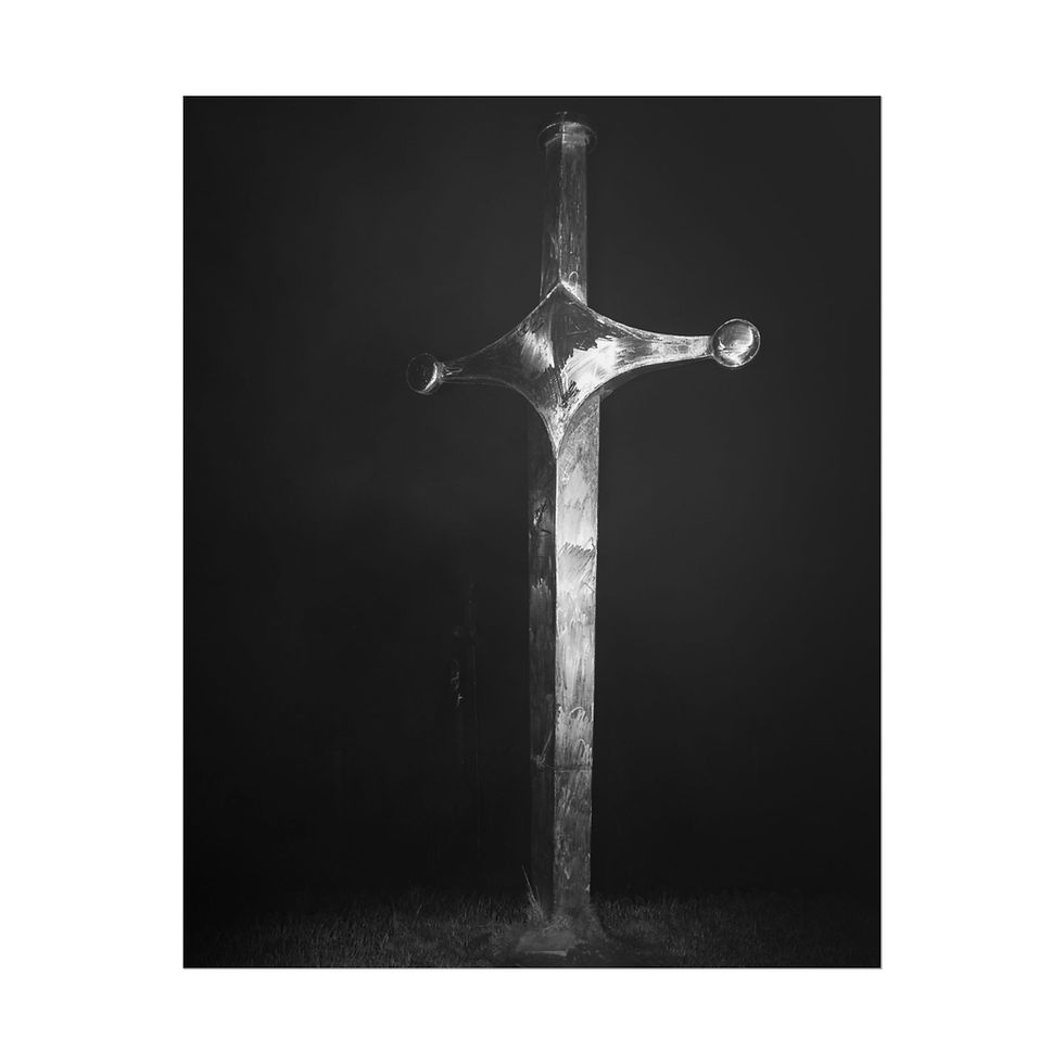 Thumbnail: Ancient sword standing upright against a dark, somber background.