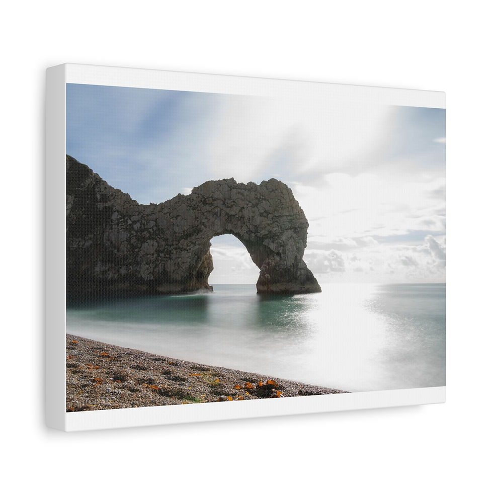 Thumbnail: Iconic Durdle Door natural arch, calm ocean, bright sun reflecting.