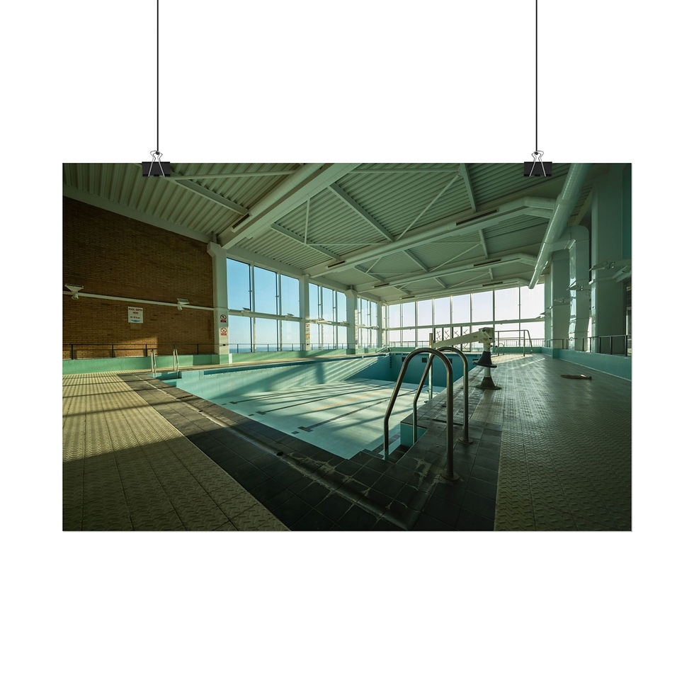 Thumbnail: Empty, abandoned indoor swimming pool with large windows and bright light.