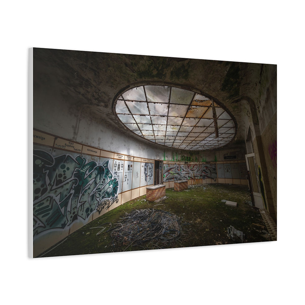 Thumbnail: Abandoned circular room with graffiti walls, mossy floor, large oval skylight.